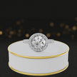 360° video of a Round Cut Halo Lab-Grown Diamond Engagement Ring in 18kt White Gold featuring a round brilliant centre diamond, sparkling diamond halo and diamond-set shoulders.