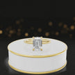 360 degree spinning video of 4-claw emerald cut engagement ring with hidden halo in 18kt yellow gold