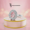 360° rotating view of an Oval Lab-Created Pink Diamond Halo Ring in 18kt white gold featuring an oval lab-created pink diamond surrounded by round brilliant lab-grown diamonds.