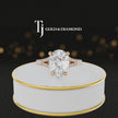 360° product view of a pear cut split shank lab-grown diamond engagement ring in 18kt rose gold featuring a pear-cut centre diamond, classic four-claw cathedral setting and diamond-set split shank.