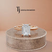 360-degree spinning view of a 1.5 carat emerald cut lab-grown diamond solitaire engagement ring in 18kt rose gold with a 4-claw setting