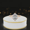 360-degree rotating view of a 1.5 carat oval cut diamond solitaire engagement ring in an 18kt rose gold 6 claw setting by TJ Diamond