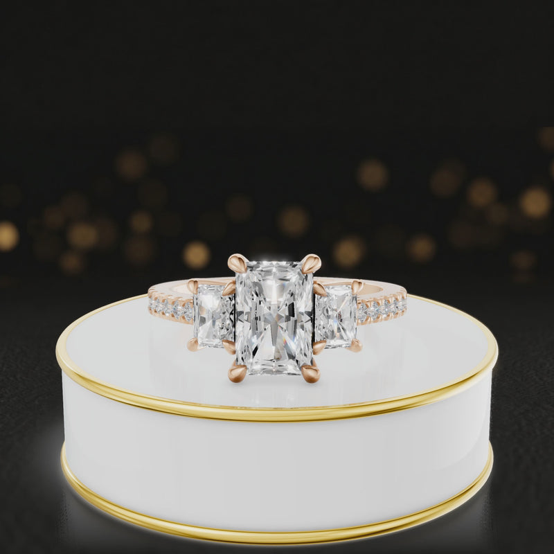 360-degree spinning view of a radiant cut three-stone lab-grown diamond engagement ring in 18kt rose gold with diamond shoulders