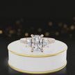 360-degree spinning view of a radiant cut three-stone lab-grown diamond engagement ring in 18kt rose gold with diamond shoulders