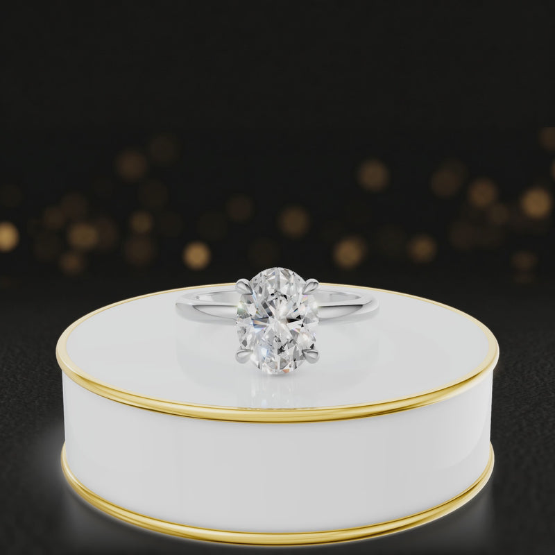 360 degree spinning video of 4-claw oval cut engagement ring with hidden halo in 18kt white gold