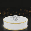 360 degree spinning video of 4-claw oval cut engagement ring with hidden halo in 18kt white gold