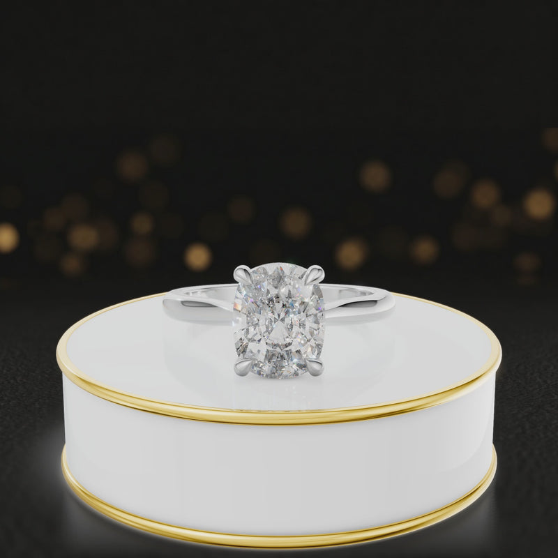 360-degree rotating view of a 1.5 carat cushion cut diamond solitaire engagement ring in an 18kt white gold 4 claw setting by TJ Diamond