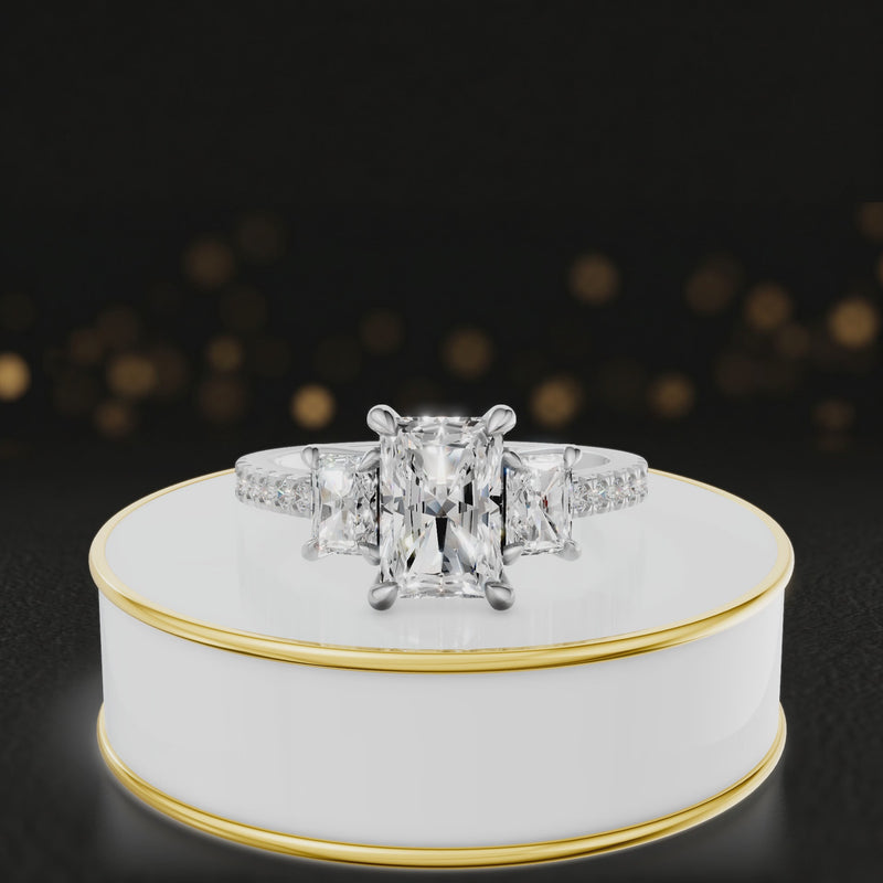 360-degree spinning view of a radiant cut three-stone lab-grown diamond engagement ring in 18kt white gold with diamond shoulders