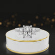 360-degree spinning view of a radiant cut three-stone lab-grown diamond engagement ring in 18kt white gold with diamond shoulders