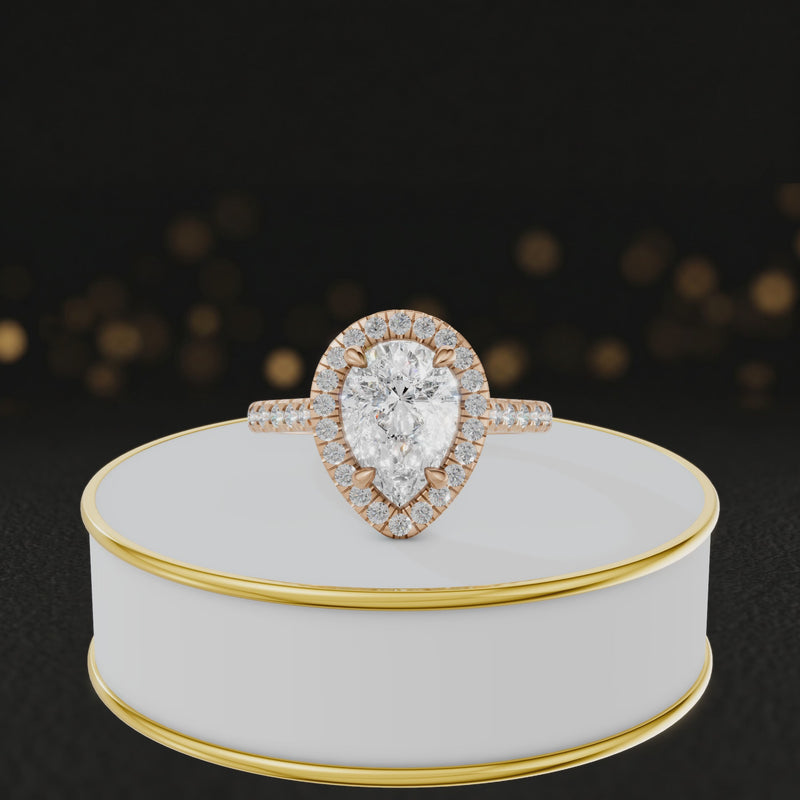 360° video of a Pear Cut Halo Lab-Grown Diamond Engagement Ring in 18kt Rose Gold featuring a pear-cut centre diamond, sparkling diamond halo and diamond-set shoulders.