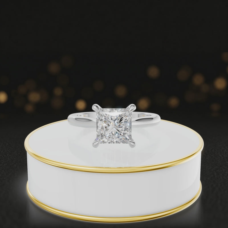 360-degree rotating view of a 1.5 carat princess cut diamond solitaire engagement ring in an 18kt white gold 4 claw setting by TJ Diamond