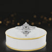 360-degree rotating view of a 1.5 carat oval cut diamond solitaire engagement ring in an 18kt white gold 6 claw setting by TJ Diamond