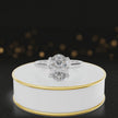 360-degree rotating view of a 1.5 carat oval cut diamond solitaire engagement ring in an 18kt white gold 4 claw setting by TJ Diamond.