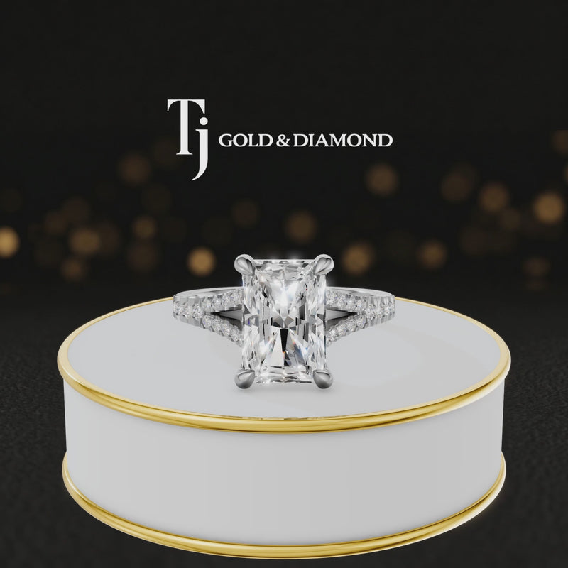 360° product view of a radiant cut split shank lab-grown diamond engagement ring in 18kt white gold featuring a radiant-cut centre diamond, classic four-claw cathedral setting and diamond-set split shank.
