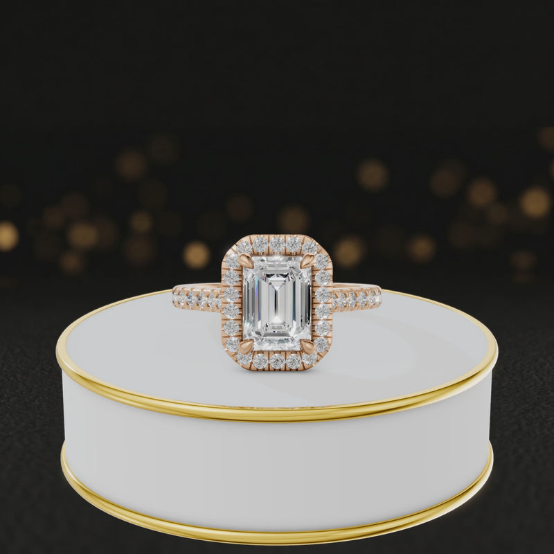360° video of an Emerald Cut Halo Lab-Grown Diamond Engagement Ring in 18kt Rose Gold featuring an emerald-cut centre diamond, sparkling diamond halo and diamond-set shoulders.