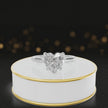 360-degree rotating view of a 1.5 carat heart cut diamond solitaire engagement ring in an 18kt white gold 4 claw setting by TJ Diamond