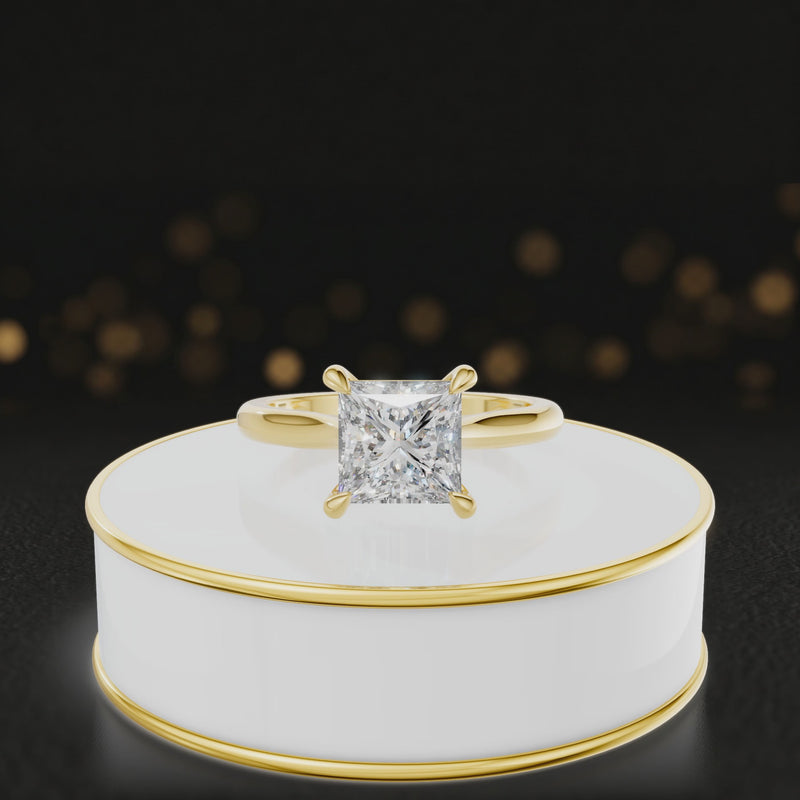 360-degree rotating view of a 1.5 carat princess cut diamond solitaire engagement ring in an 18kt yellow gold 4 claw setting by TJ Diamond