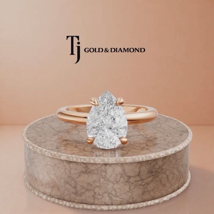360-degree rotating view of a 1.5 carat pear cut lab-grown diamond solitaire engagement ring in 18kt rose gold with a 4-claw setting