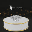 360° product view of a round cut split shank lab-grown diamond engagement ring in 18kt white gold featuring a round brilliant centre diamond, classic four-claw cathedral setting and diamond-set split shank.