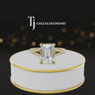 360° product view of an emerald cut split shank lab-grown diamond engagement ring in 18kt yellow gold featuring an emerald-cut centre diamond, classic four-claw cathedral setting and diamond-set split shank.