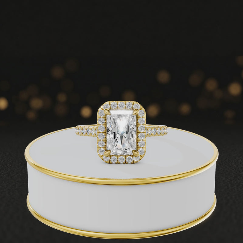 360° video of a Radiant Cut Halo Lab-Grown Diamond Engagement Ring in 18kt Yellow Gold featuring a radiant-cut centre diamond, sparkling diamond halo and diamond-set shoulders.