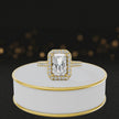 360° video of a Radiant Cut Halo Lab-Grown Diamond Engagement Ring in 18kt Yellow Gold featuring a radiant-cut centre diamond, sparkling diamond halo and diamond-set shoulders.