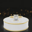 360-degree rotating view of a 1.5 carat emerald cut diamond solitaire engagement ring in an 18kt yellow gold 4 claw setting by TJ Diamond