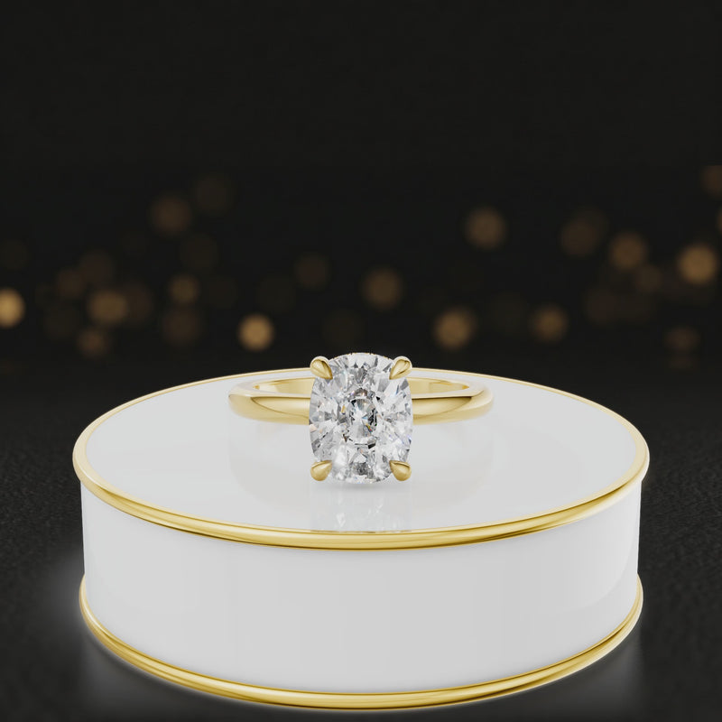 360 degree spinning video of 4-claw cushion cut engagement ring with hidden halo in 18kt yellow gold
