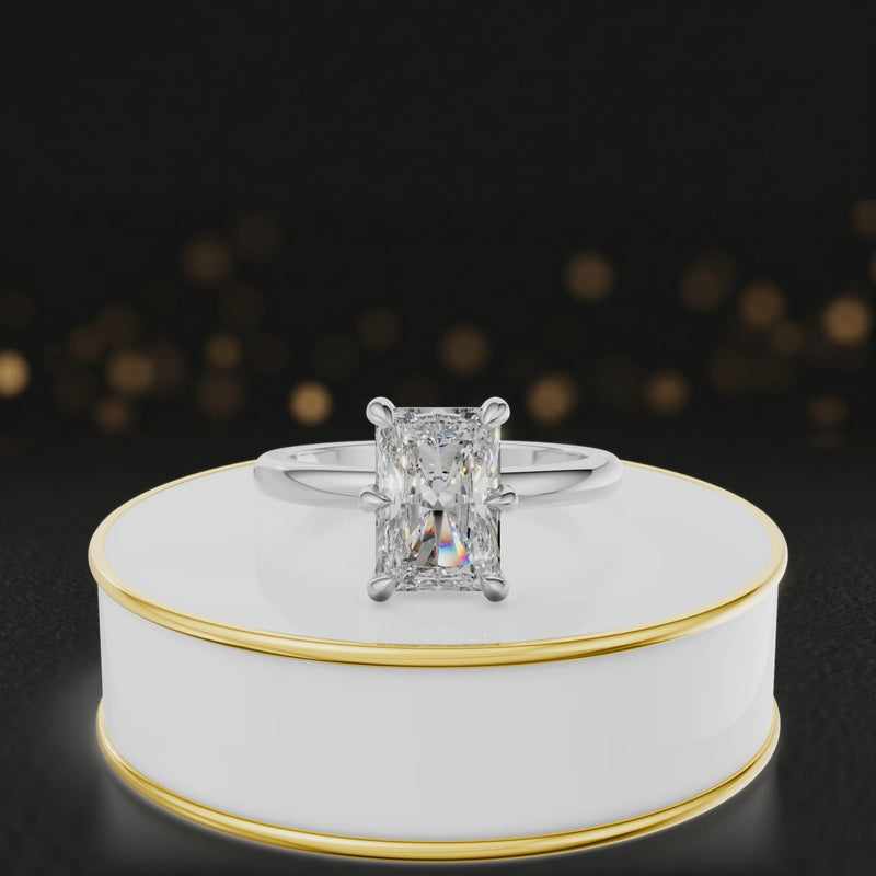 360-degree rotating view of a 1.5 carat radiant cut diamond solitaire engagement ring in an 18kt white gold 6 claw setting by TJ Diamond
