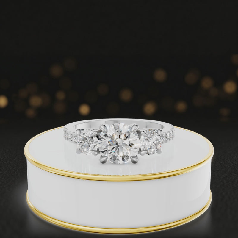 360-degree spinning view of a round cut three-stone lab-grown diamond engagement ring in 18kt white gold with diamond shoulders