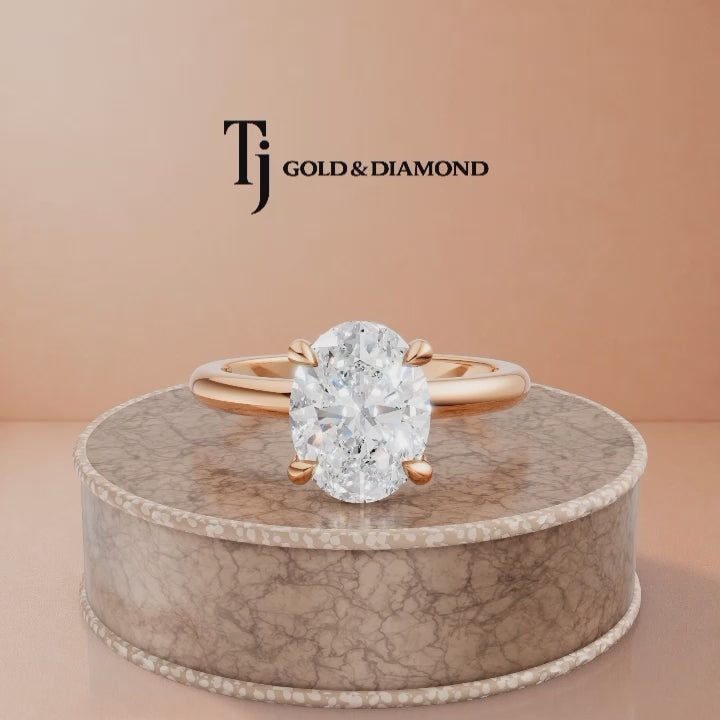 360-degree rotating view of a 1.5 carat oval cut lab-grown diamond solitaire engagement ring in 18kt rose gold with a 4-claw setting