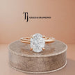 360-degree rotating view of a 1.5 carat oval cut lab-grown diamond solitaire engagement ring in 18kt rose gold with a 4-claw setting