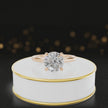 360-degree rotating view of a 1.5 carat round brilliant cut diamond solitaire engagement ring in an 18kt rose gold 4 claw setting by TJ Diamond