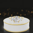 360° rotating view of a cushion-cut lab-grown diamond trilogy engagement ring in 18ct yellow gold, featuring three cushion brilliant lab-grown diamonds.