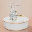360° rotating view of a 4ct oval lab-grown diamond solitaire engagement ring in 18kt yellow gold featuring a hidden diamond halo.