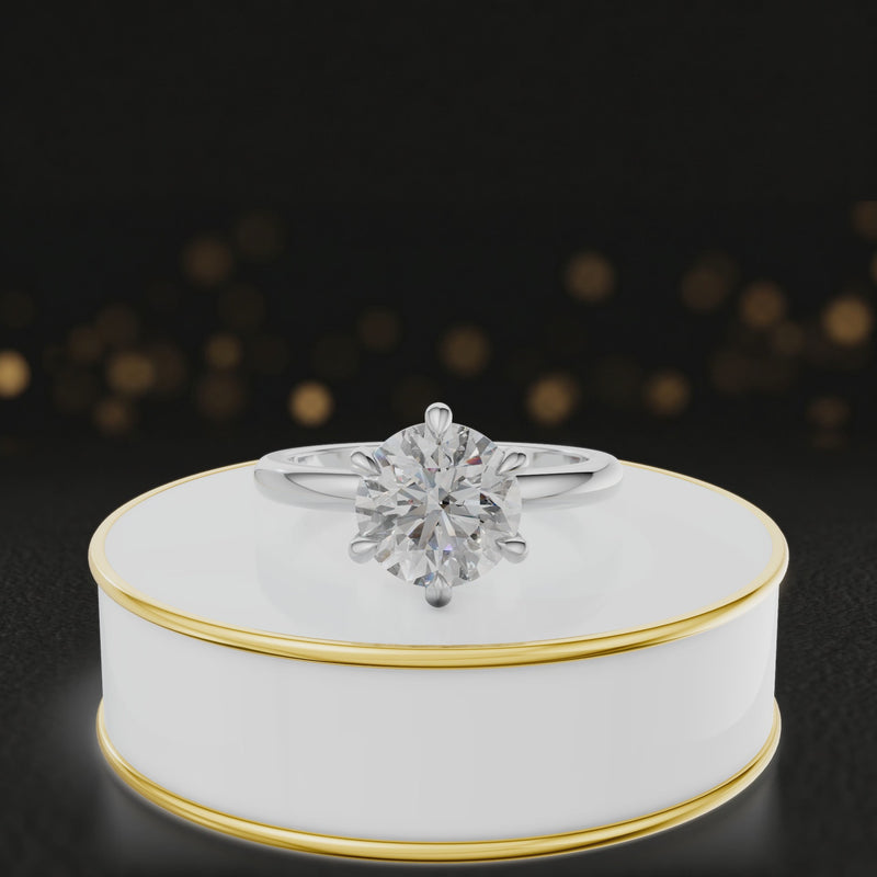360-degree rotating view of a 1.5 carat round brilliant cut diamond solitaire engagement ring in an 18kt white gold 6 claw setting by TJ Diamond