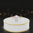 360 degree spinning video of 4-claw pear cut engagement ring with hidden halo in 18kt rose gold