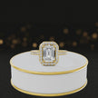 360° video of an Emerald Cut Halo Lab-Grown Diamond Engagement Ring in 18kt Yellow Gold featuring an emerald-cut centre diamond, sparkling diamond halo and diamond-set shoulders.