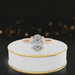 360-degree rotating view of a 1.5 carat oval cut diamond solitaire engagement ring in an 18kt rose gold 4 claw setting by TJ Diamond