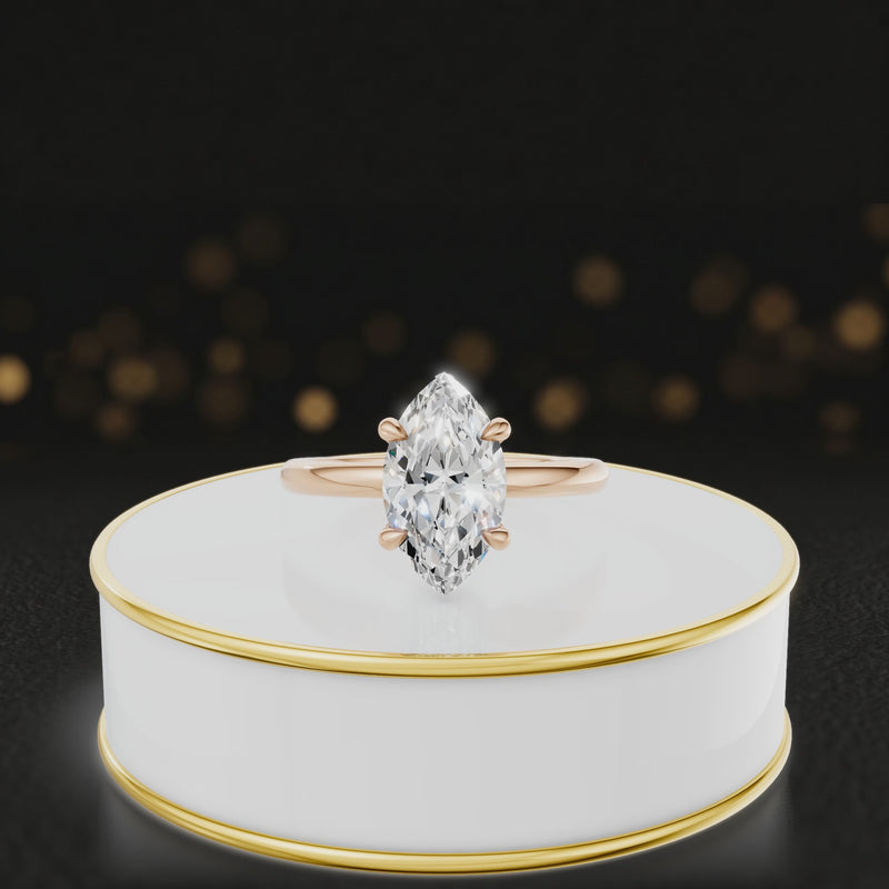 360 degree spinning video of 4-claw marquise cut engagement ring with hidden halo in 18kt rose gold