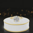 360-degree rotating view of a 1.5 carat round brilliant cut diamond solitaire engagement ring in an 18kt yellow gold 4 claw setting by TJ Diamond