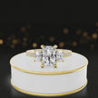 360-degree spinning view of a radiant cut three-stone lab-grown diamond engagement ring in 18kt yellow gold with diamond shoulders