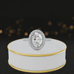 360° video of an Oval Cut Halo Lab-Grown Diamond Engagement Ring in 18kt White Gold featuring an oval-cut centre diamond, sparkling diamond halo and diamond-set shoulders.