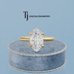 360-degree rotating view of a 1.5 carat marquise cut lab-grown diamond solitaire engagement ring in 18kt yellow gold with a 4-claw setting