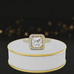 360° video of a Princess Cut Halo Lab-Grown Diamond Engagement Ring in 18kt Yellow Gold featuring a princess-cut centre diamond, sparkling diamond halo and diamond-set shoulders.