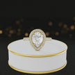 360° video of a Pear Cut Halo Lab-Grown Diamond Engagement Ring in 18kt Yellow Gold featuring a pear-cut centre diamond, sparkling diamond halo and diamond-set shoulders.