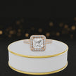 360° video of a Princess Cut Halo Lab-Grown Diamond Engagement Ring in 18kt Rose Gold featuring a princess-cut centre diamond, sparkling diamond halo and diamond-set shoulders.