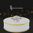360° product view of a round cut split shank lab-grown diamond engagement ring in 18kt rose gold featuring a round brilliant centre diamond, classic four-claw cathedral setting and diamond-set split shank.